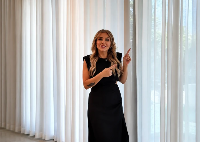 Made-to-measure curtains being fitted